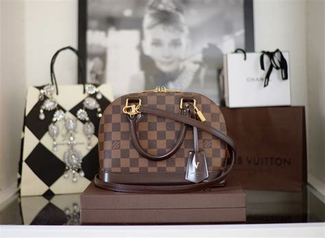 louis vuitton alma bb reviews.